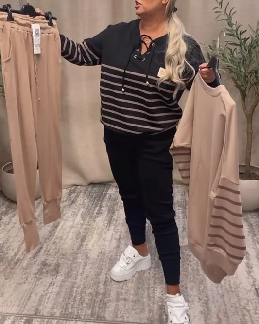 Gadījuma svītraini sporta divdaļīgi uzvalki