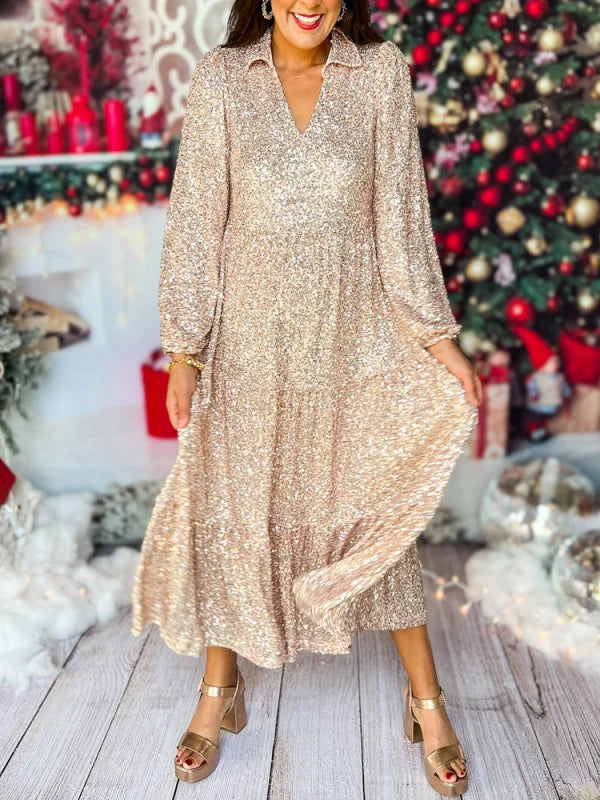 Kleita ar mirdzošiem gariem piedurknēm