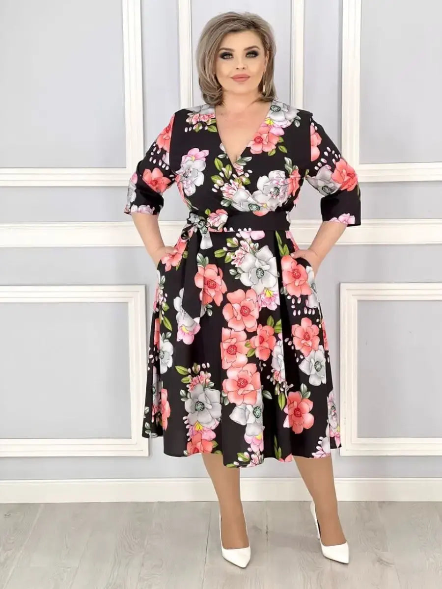 Krāšņs ziedu kleita sievietēm