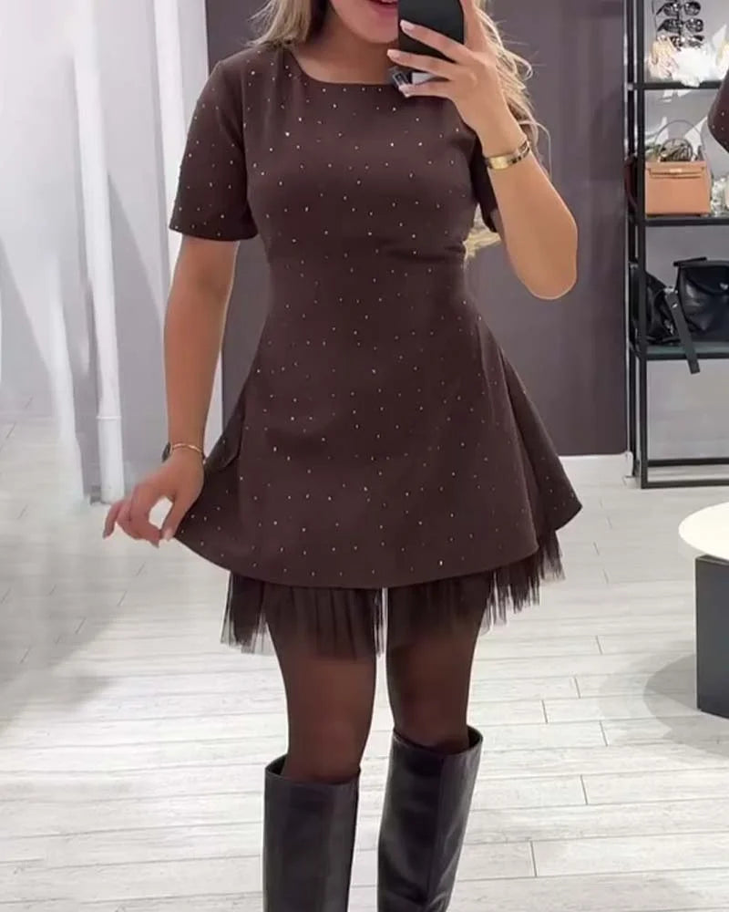 Eleganta kleita ar rotājumiem