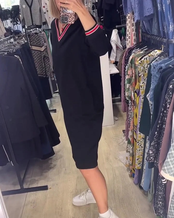 Kleita ar V formas izgriezumu