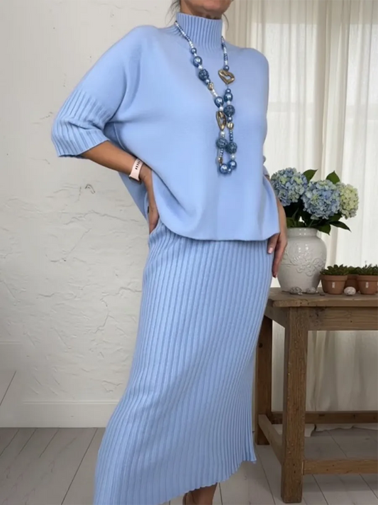 Elegants džemperis ar augstu apkakli un svārki, divdaļīgs komplekts