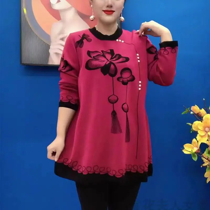 Silts sieviešu džemperis ar ziedu