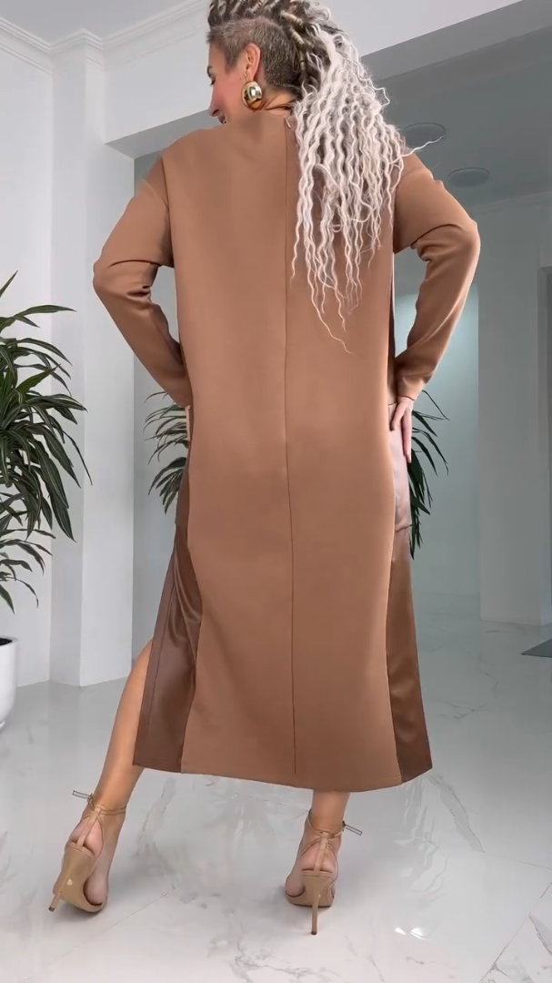 Skaista kleita ar ādas detaļām