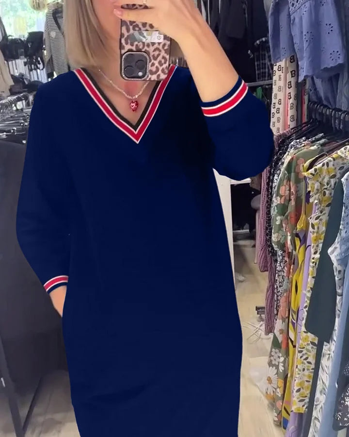 Kleita ar V formas izgriezumu