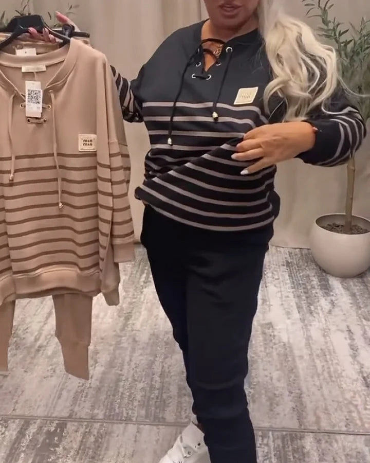 Gadījuma svītraini sporta divdaļīgi uzvalki