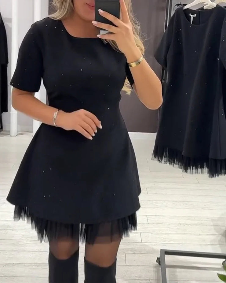 Eleganta kleita ar rotājumiem