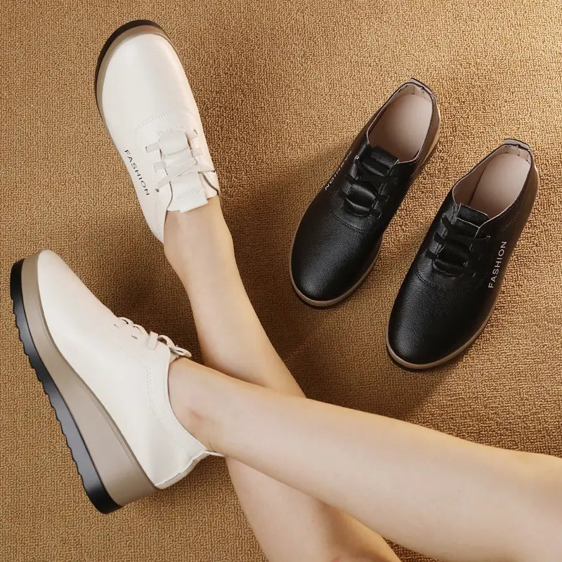 Sieviešu ādas zābaki ar biezu zoli