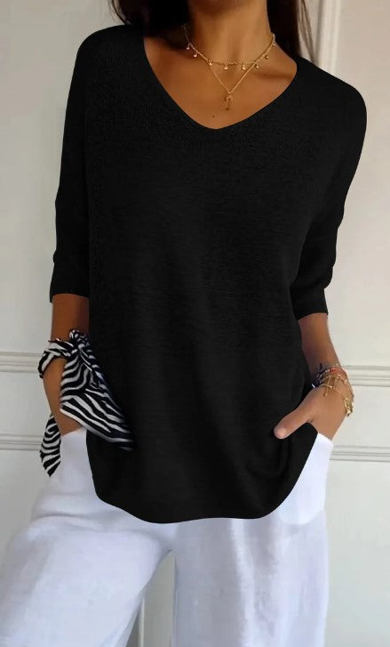 Vienkāršs džemperis ar V veida kakla izgriezumu