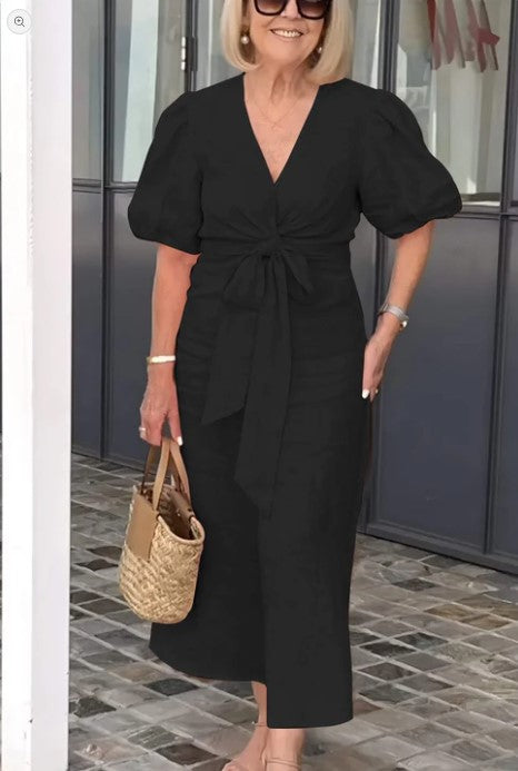 Sieviešu kleita ar uzpūstām piedurknēm