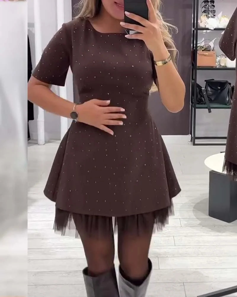 Eleganta kleita ar rotājumiem