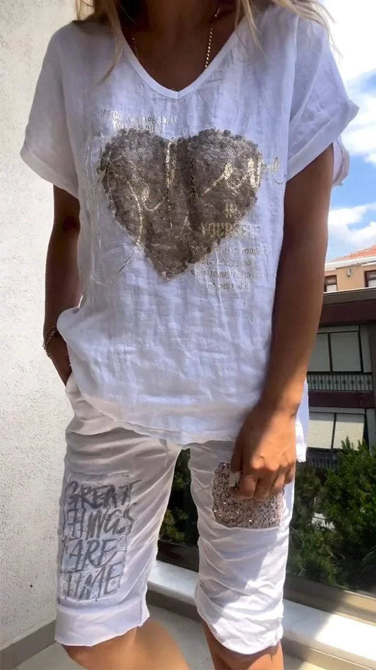 Divu daļu brīvā laika kostīms ar sirdi