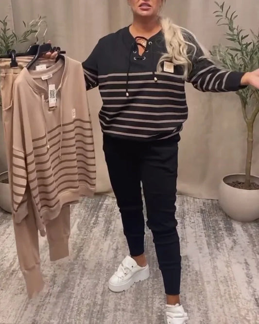 Gadījuma svītraini sporta divdaļīgi uzvalki