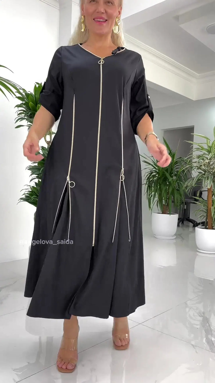 Kleita ar rāvējslēdzējiem