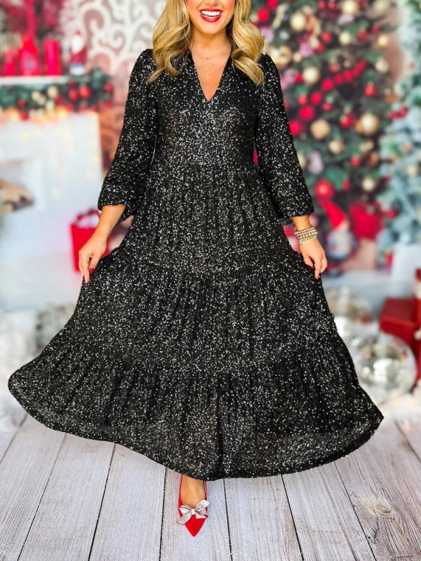 Kleita ar mirdzošiem gariem piedurknēm