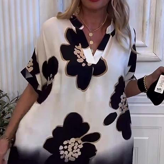 Brīva kleita ar ziediem