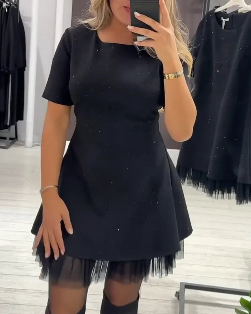 Eleganta kleita ar rotājumiem